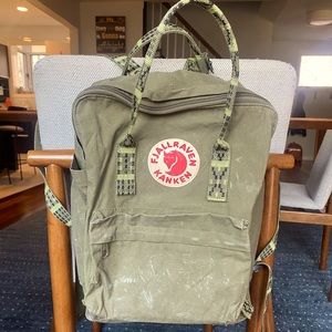 Dark green Fjallraven Kanken backpack